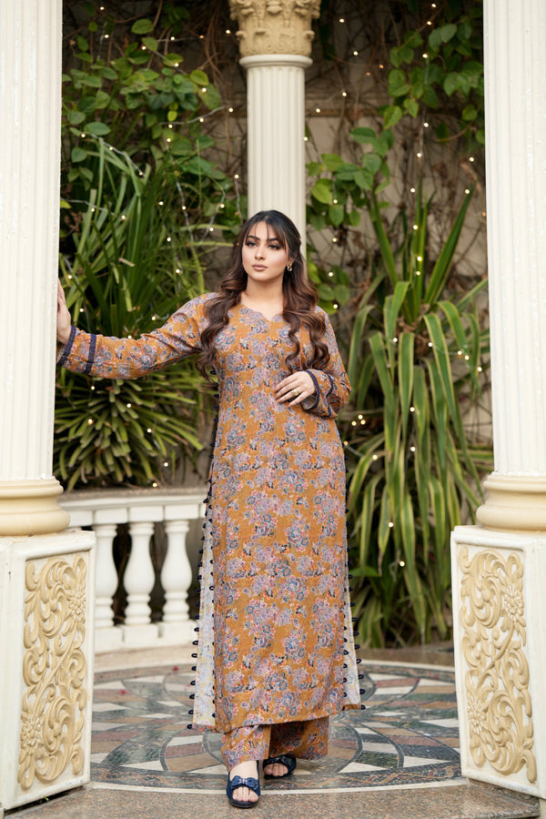 Ocher Muse mustard floral printed linen shirt featuring a straight-cut and full sleeves